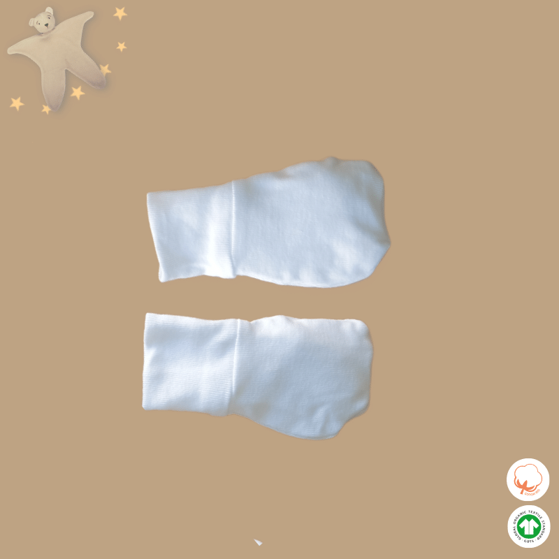 une paire de moufles blanc en coton bio GOTS une paire de moufles blanc en coton bio GOTS